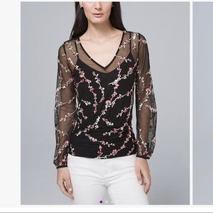 Sheer black V-neck top with floral embroidery